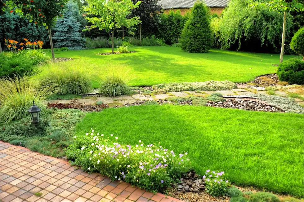 beautiful landscape design pavers, plants, grass