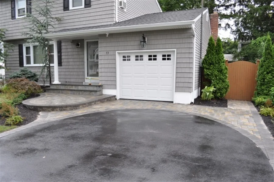 asphalt and paver driveway